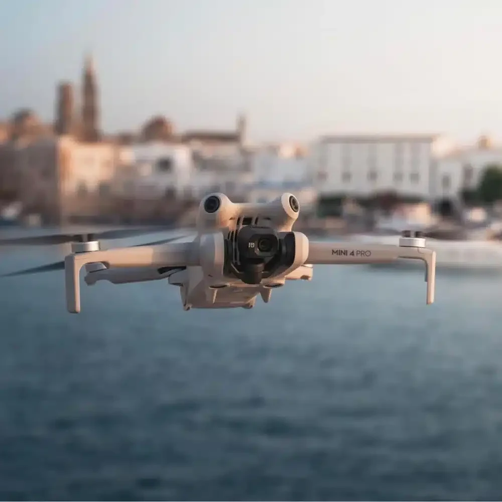 DJI Mini 4 Pro Fly More Combo with DJI RC 2 - Under 249g 4K HDR Drone, 48MP, Omnidirectional Sensing, 3 Batteries 10 DJI Mini 4 Pro Fly More Combo in use