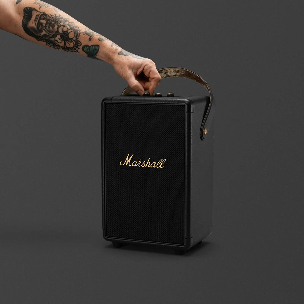 Marshall Tufton Black and Brass - 80W Portable Bluetooth Speaker, 102dB, 20H Battery, Multi-Directional Sound 5 Marshall Tufton Black and Brass in use