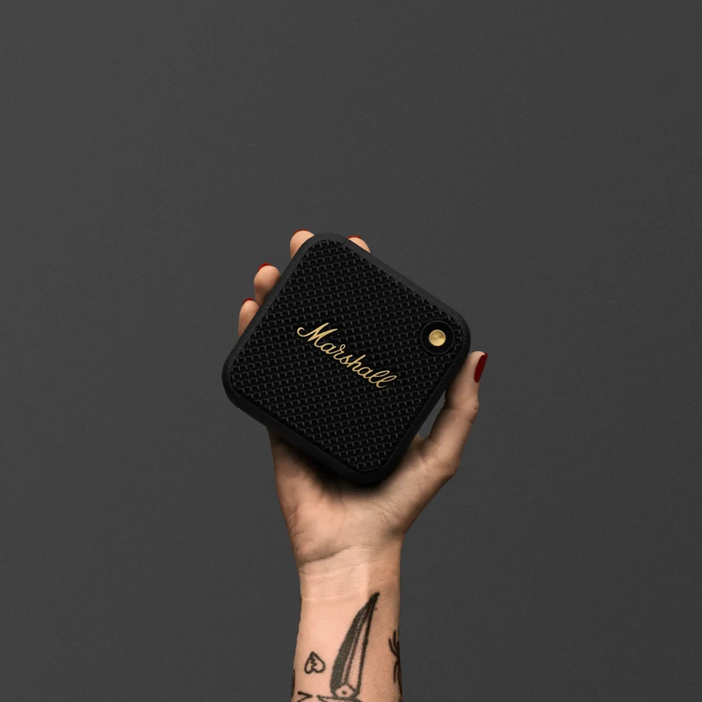 Marshall Willen II Black and Brass - 38W Mini Bluetooth Speaker, IP67 Waterproof, 17H Battery, Strap Mount 5 Marshall Willen II Black and Brass in use